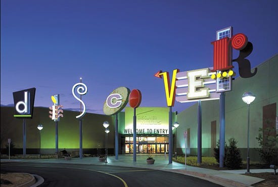 The playful sign identifying Discover Mills at the mall's entrance.