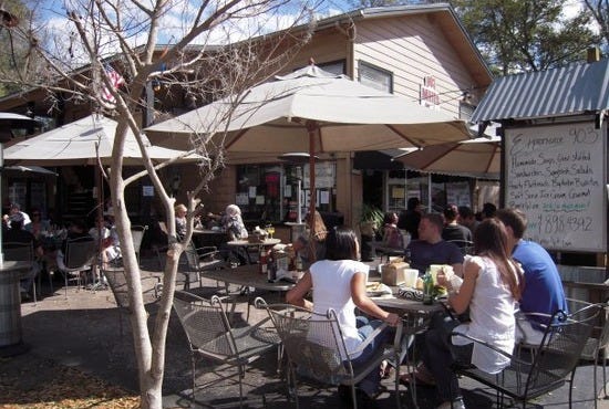 Patrons enjoy lunch at 903 Mills Market, a downtown deli in Orlando
