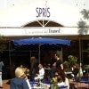 Patrons enjoying the outdoor dining option at Spris