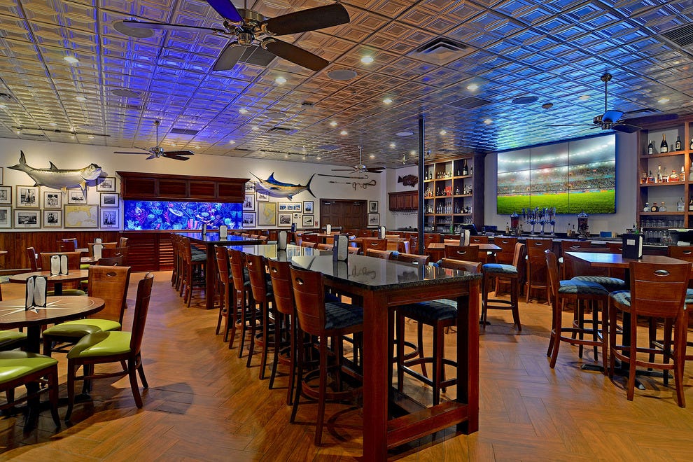 Swim with the Fishes at Guy Harvey RumFish Grill & Bar