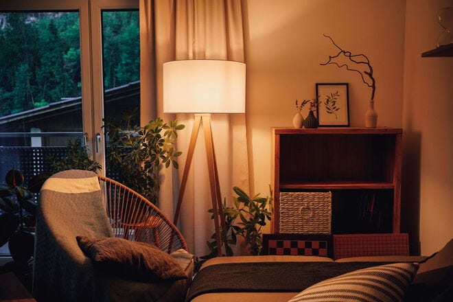 Forget the overhead lighting and opt for lamps to create a cozy home environment