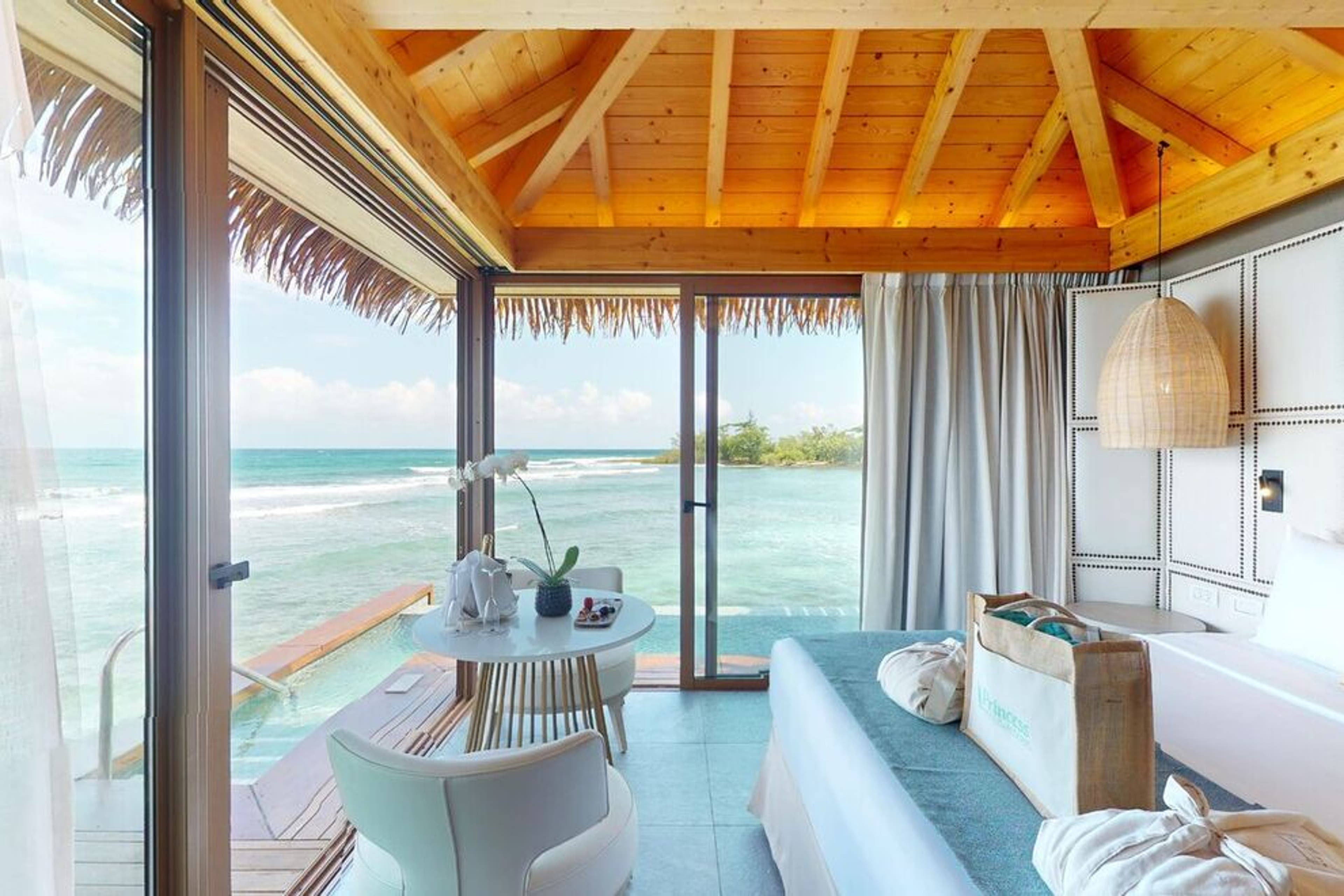 This jewel of an adults-only, all-inclusive property in Jamaica features overwater bungalows