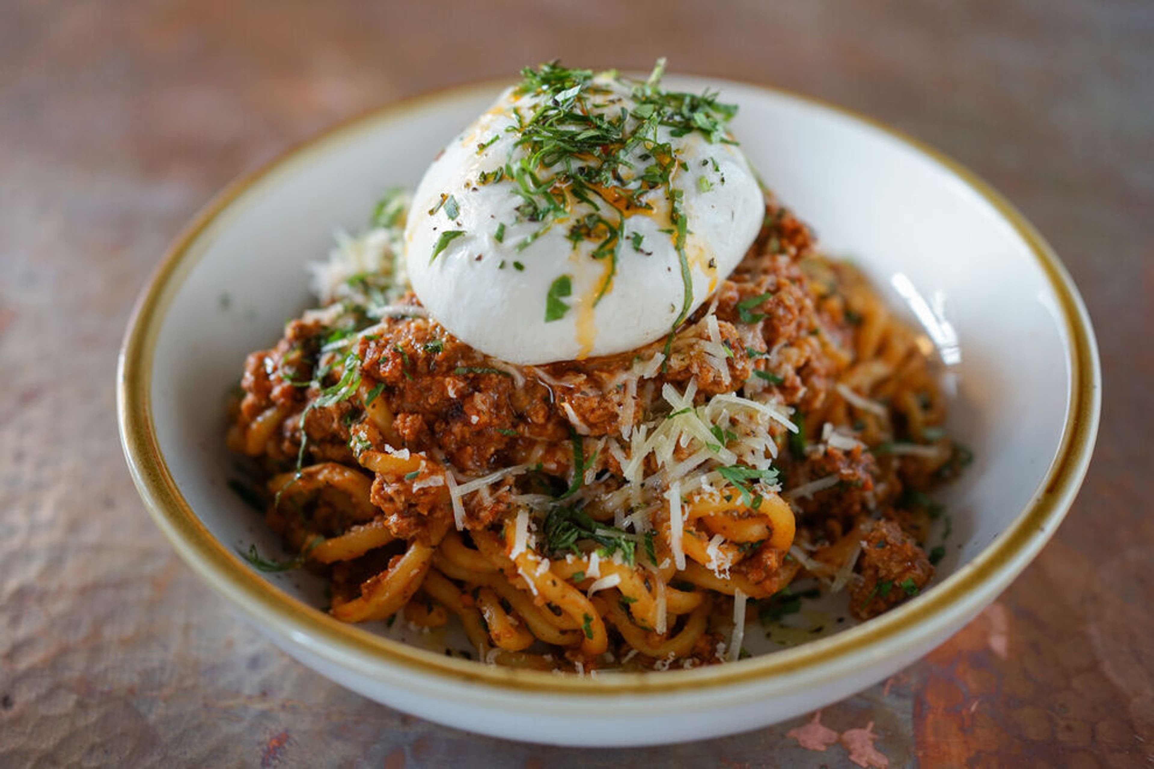 Spaghetti Bolognese + Burrata from Fire & The Feast, an Italian Restaurant located in Edmonds, WA. 